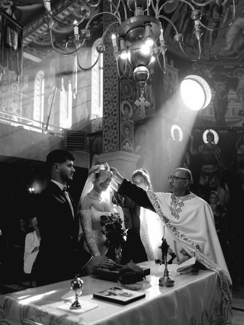 A ceremony illuminated by dramatic shafts of light