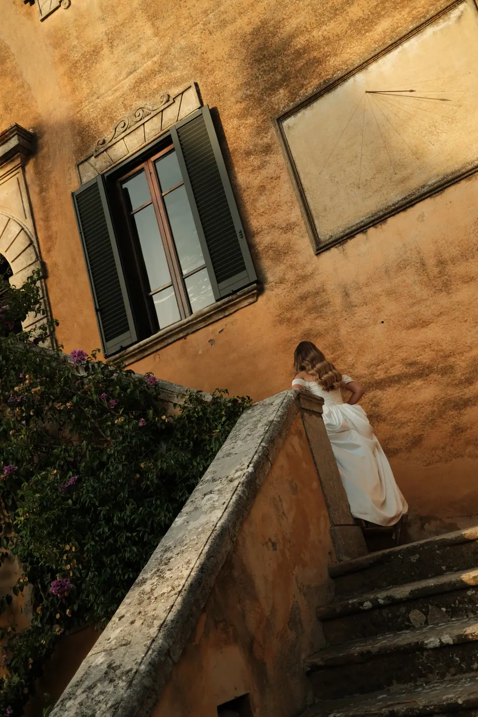 Ana coming down the villa’s outdoor stone staircase