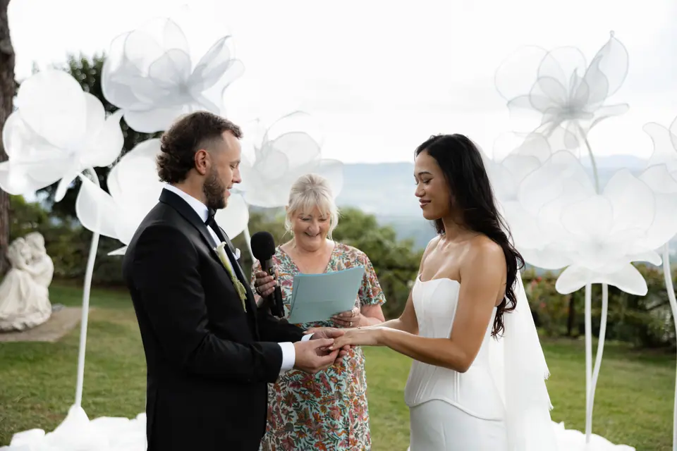 Rory placing the ring on Sivitha’s finger as the celebrant reads