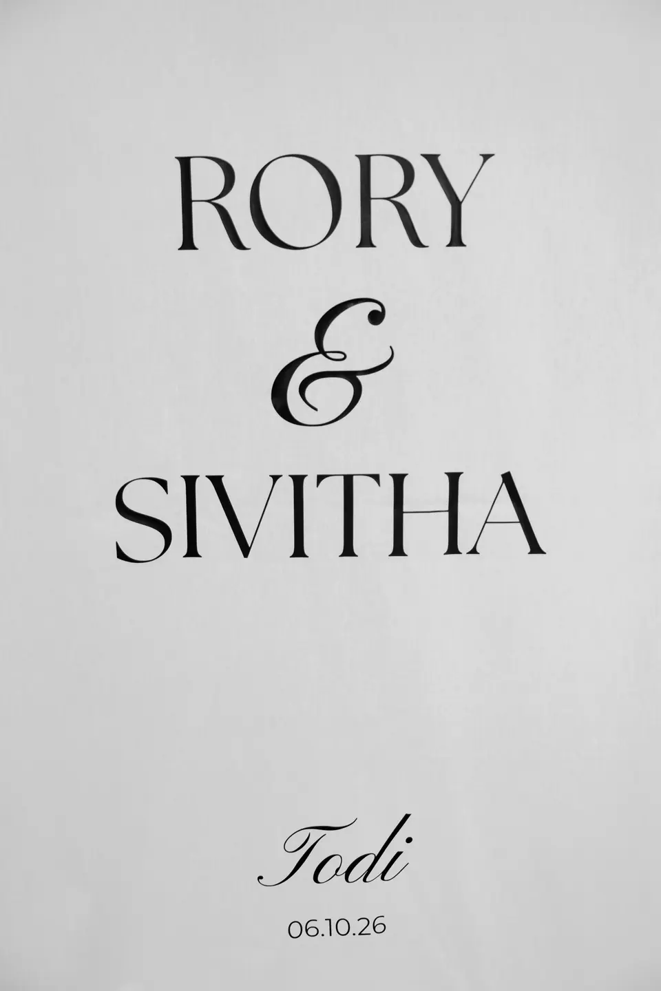 Close-up of the sign reading “Rory & Sivitha, Todi 06.10.26”